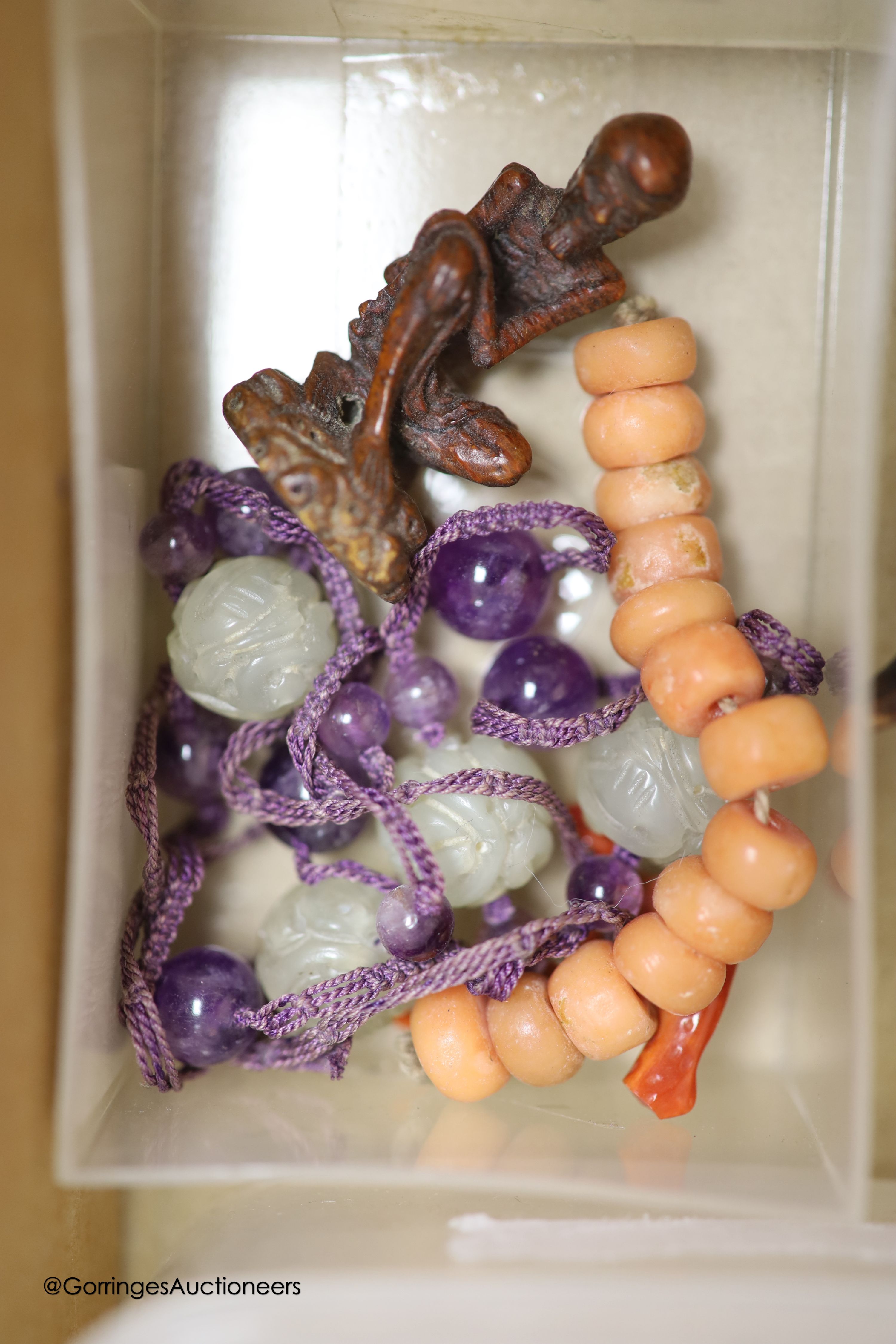 Four shot balls, two daggers, various weights, a pair of binoculars and Chinese hardstone cameo beads etc